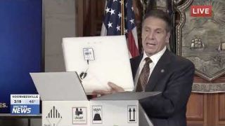 Gov  Andrew Cuomo D NY unveils one of the state’s first sample boxes of vaccines