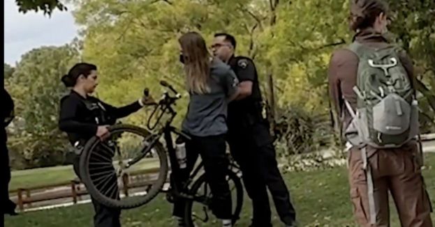 Video: Masked Man Steals Signs, Declares ‘Kirk Got Shot In The Neck For A Reason’ On UNM Campus